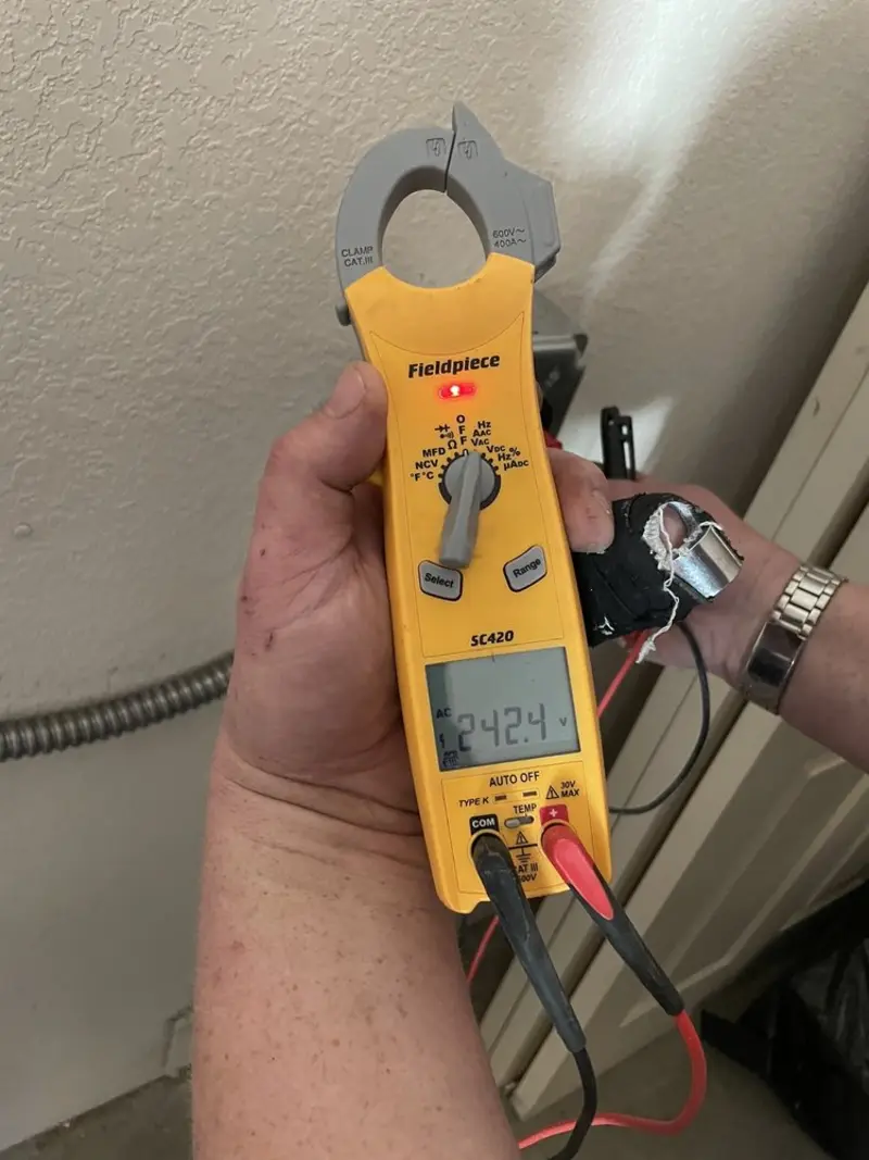 Voltage testing with clamp meter during Circuit Breaker Repair in Southgate